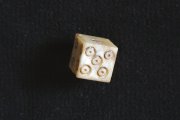 Dado da gioco con numeri a cerchielli concentrici